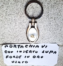Portachiavi in acciaio con inserti forse in (oro Lupa) usato ottimo stato.