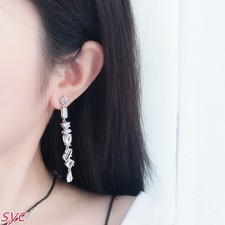 Nuovi orecchini Gema a forma di lacrima con disegno asimmetrico taglio misto lunghi rodio