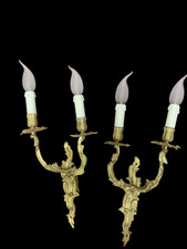 Coppia di antiche appliques in