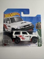 Scheda corta Mitsubishi Pajero Evolution Hot Wheels borchie fango bianco Ralli art 4x4
