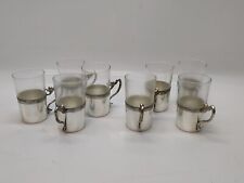 Set di  8 bicchierini da liquore in vetro e metallo argentato, Distillerie Buton