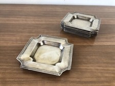 Stock Di 7 Piattini In Metallo