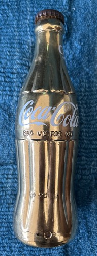 Bottiglia coca cola - bottiglia, oro