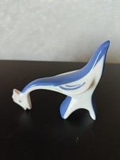 WHITE PORCELAIN FIGURINE Royal