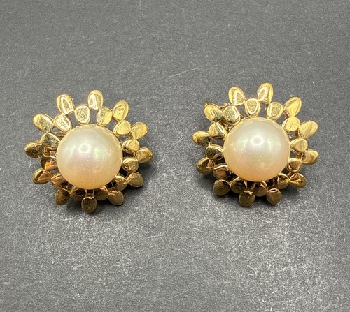 Orecchini con clip firmati