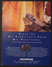 16. Olympus IS - 100S