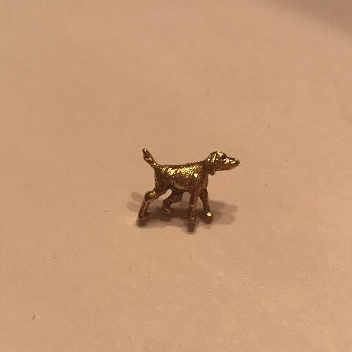 Golden tie tack setter - tack,