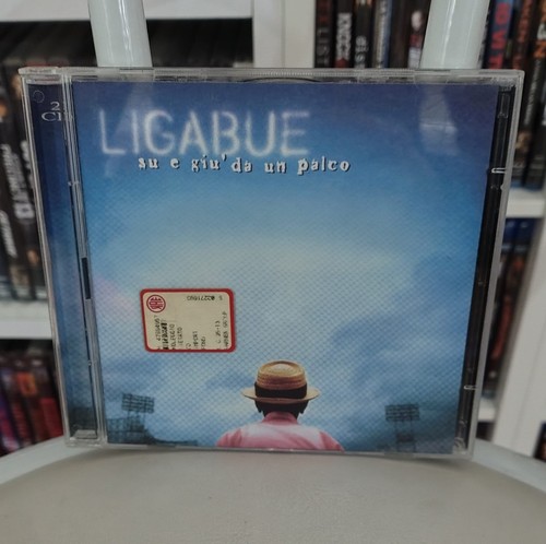 Ligabue giù da un - ligabue, e