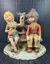 capodimonte vintage statuina porcellana anticata bimbi su panchina