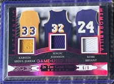 Kobe Bryant Magic Johnson Kareem Abdul-Jabbar Leaf nel gioco usato Trio 6/9