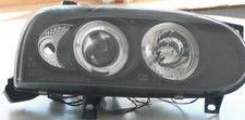 Faro proiettore sinistro Angel Eyes vetro trasparente/nero Sonar Sk3301S VW Golf 3