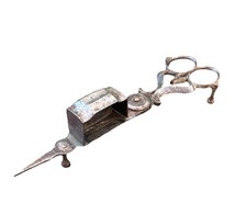 Antico stoppino in metallo