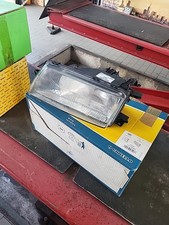 FANALE ANTERIORE SINISTRO CARELLO 54058652 OPEL VECTRA A 1988- LPA862 U.K. NUOVO