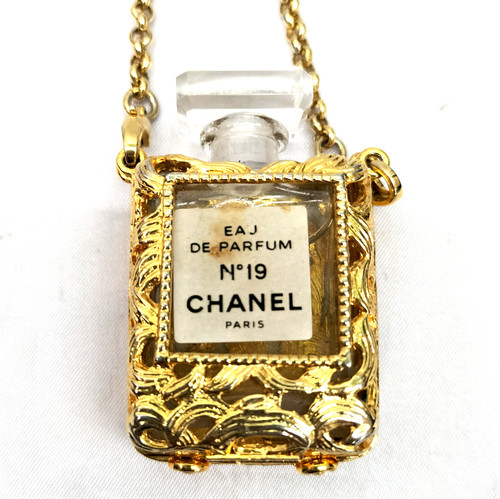 Collana con ciondolo bottiglia