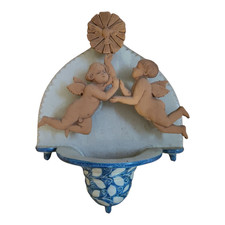 Acquasantiera in terracotta da