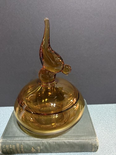 Statuina uccellino ambra coda