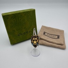 Gucci anello mod. Testa Leone metallo dorato con pietra azzurra 2020 ca