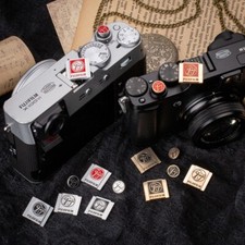 Pulsante otturatore copertura