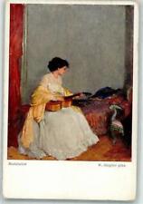 39806225 - insegna. Gaigher ragazzo donna in abito elegante suona la chitarra