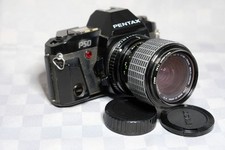 fotocamera vintage PENTAX P50 + Sigma zoom 35-70 f2.8-4.0 + filtro skylight