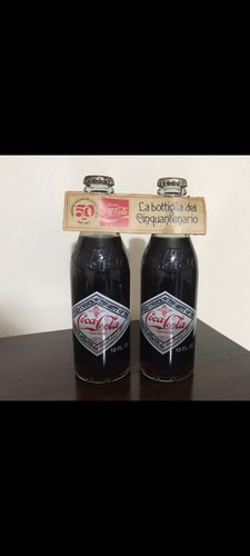 Bottiglie coca cola 50esimo - bottiglie,