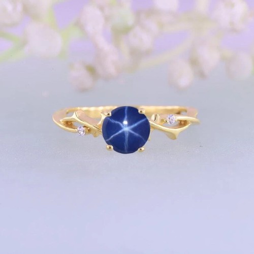 Anello con pietre preziose