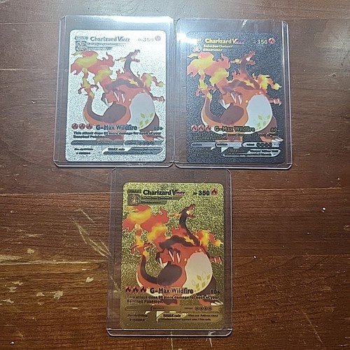 Lotto tre carte charizard - lotto,