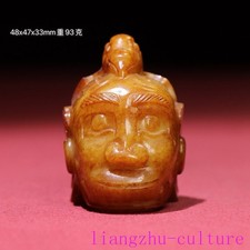 Statua testa di uccellino