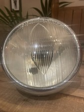 Guscio e lente faro moto Lucas