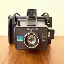 FOTOCAMERA VINTAGE POLAROID EE66 CAMERA ISTANTANEA NERA 1976 RETRÓ ANNI 70