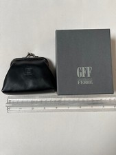 Porta spiccioli a scatto da