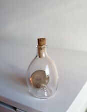 Bottiglietta in vetro soffiato con moneta interna - vintage