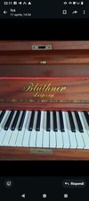 pianoforte verticale Bluthner Lipsia,usato ,In legno molto ben tenuto 