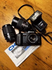 Chinon CP-7m, three lenses