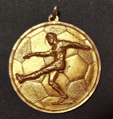 Medaglia sportiva raffigurante - sportiva,