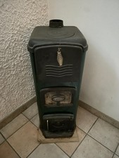 stufa a legna in ghisa usata