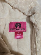 Tuta da neve con cappuccio