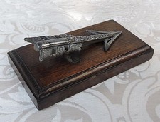 Antico fermacarte a forma di