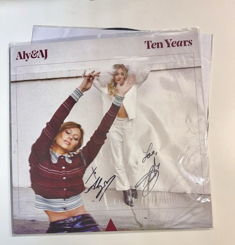 Aly ten years - &,