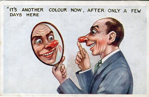 Man mirror red nose holiday