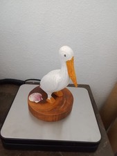 Cicogna in legno intagliato a