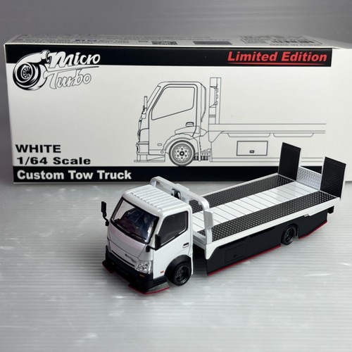 Isuzu flatbed tow - mt,