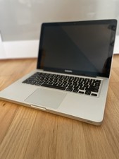 MacBook Silver. Working But