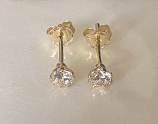 Orecchini Punto Luce in oro 18 kt Con Zircone Nuovi Peso Gr 0,7