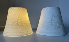 coppia di fari in ceramica