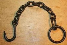 Antico gancio in ferro battuto
