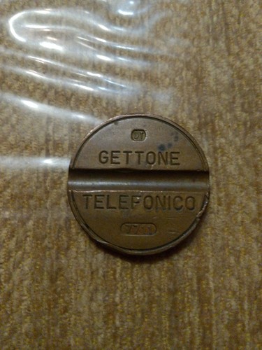 Gettone telefonico 7711 - telefonico,