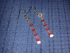 Orecchini a monachella con perle si swarovski arancio e conteria silver