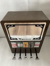 Vecchio distributore di sigarette distributore automatico di sigarette anni 70 macchina nostalgia