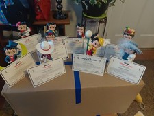 Lotto di 7 figurine vintage